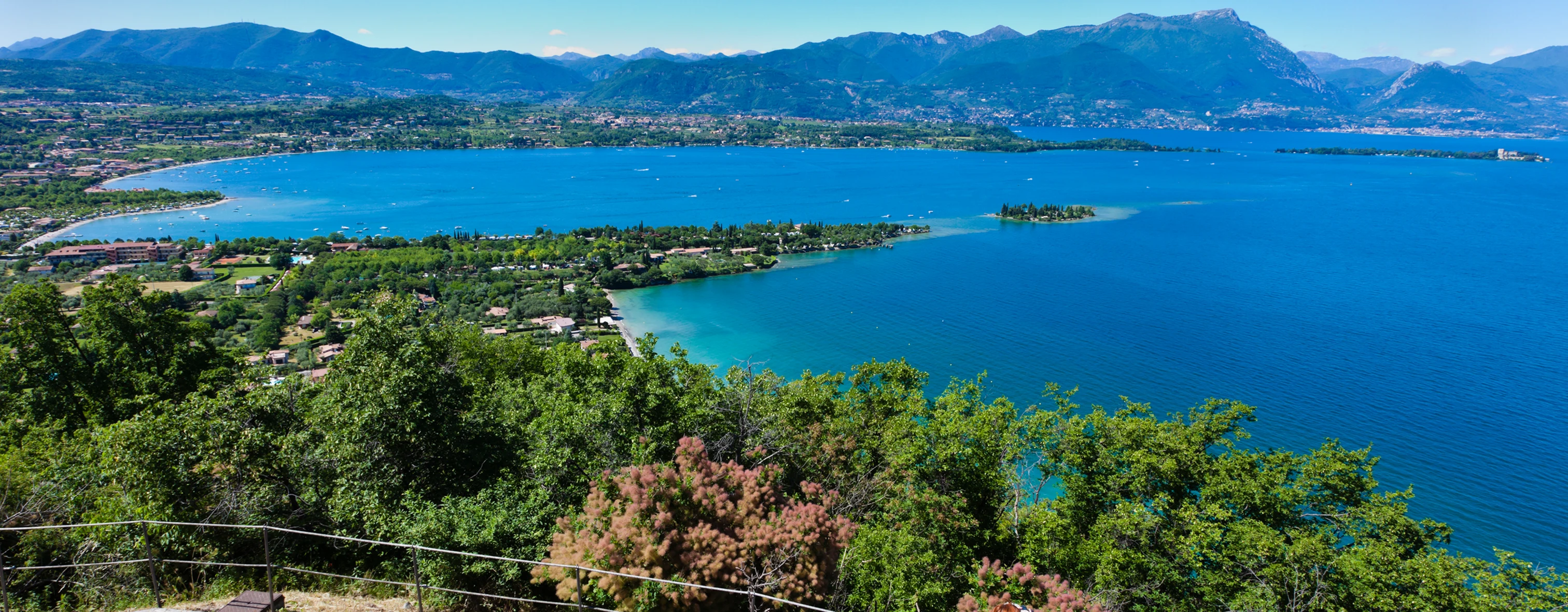 The view of Lake Garda from a street in Manerba del Garda