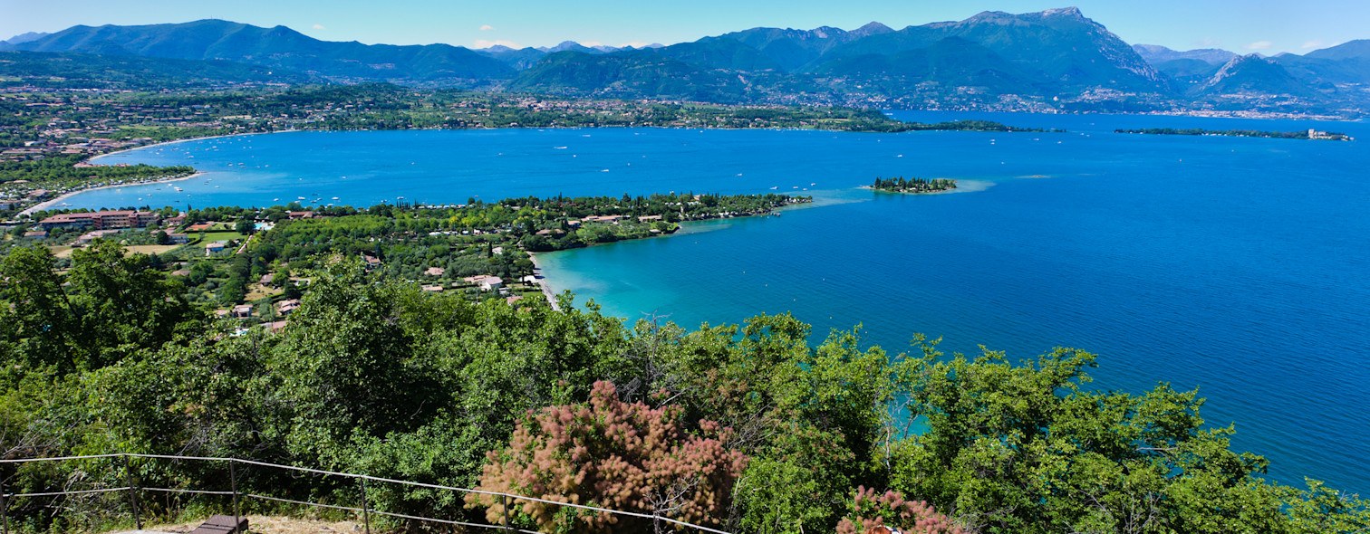 The view of Lake Garda from a street in Manerba del Garda