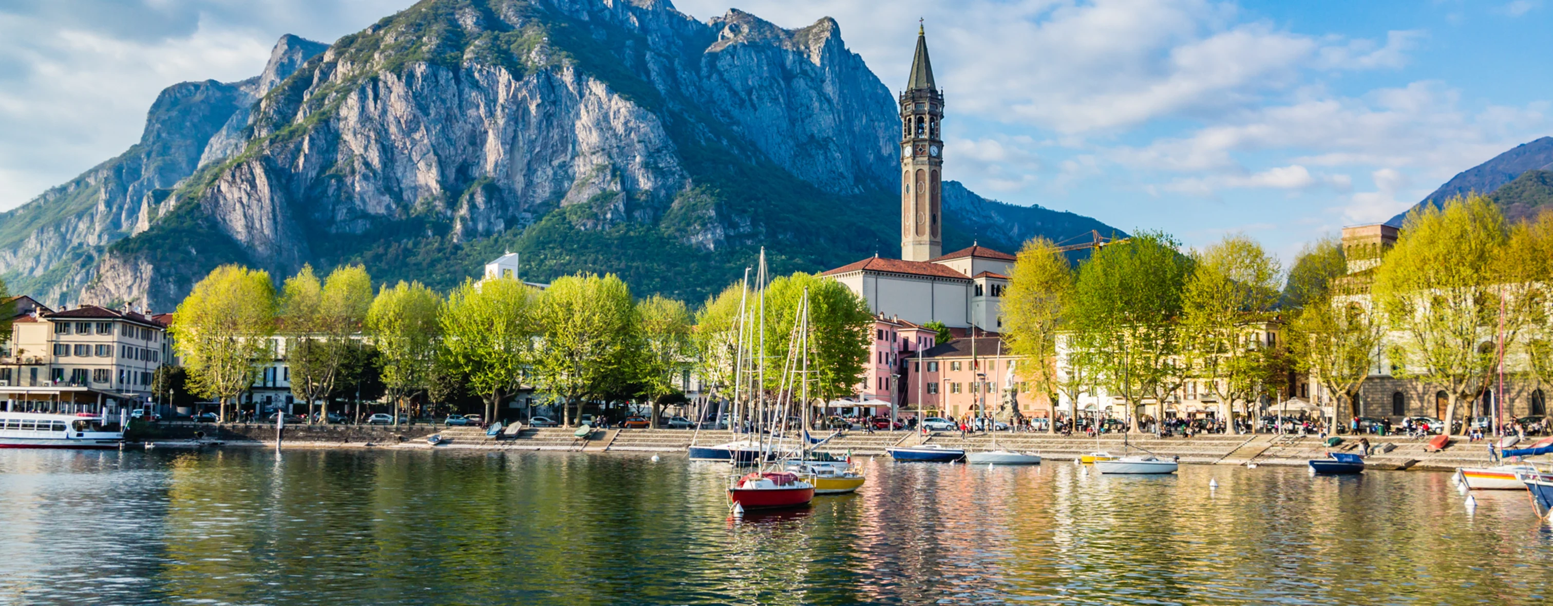 The city of Lecco and the Bell Tower of San Nicolò as seen from the lake