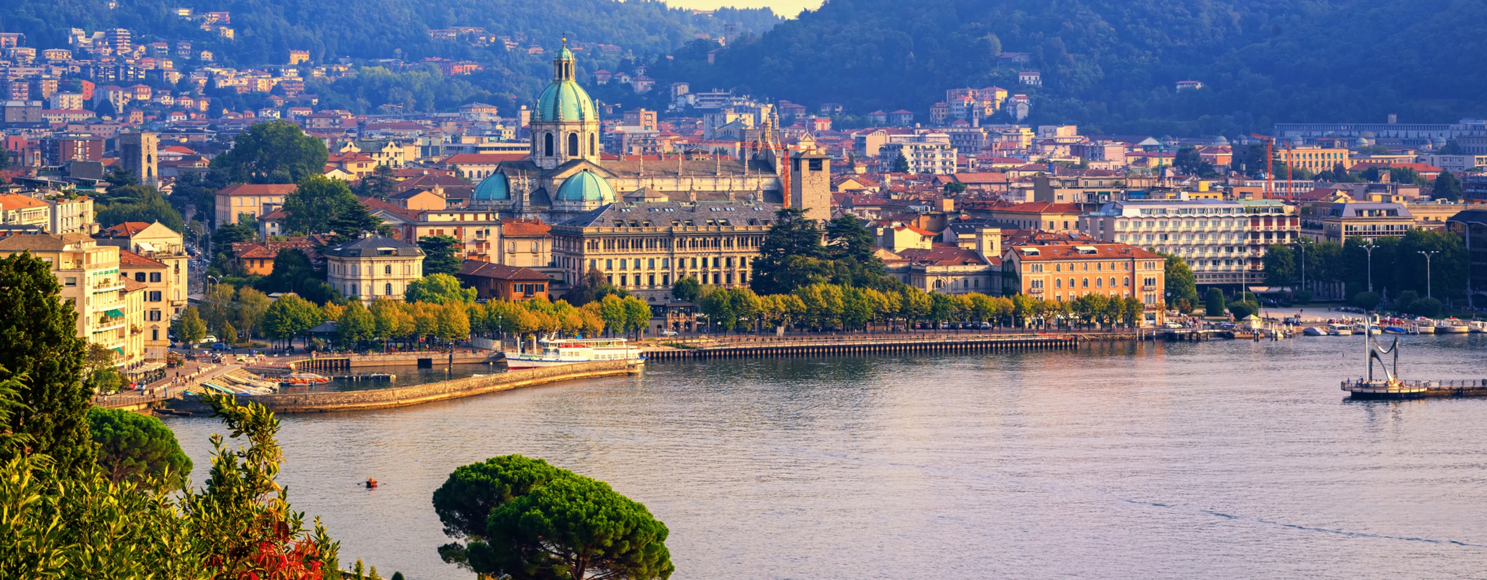 Como town at sunset as seen from the lake