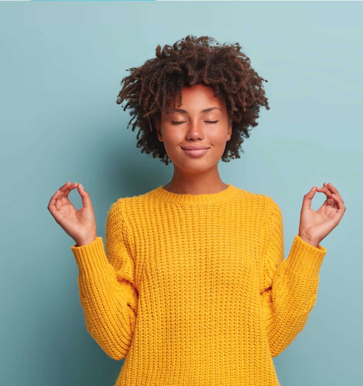 Zen woman in yellow sweater (top)