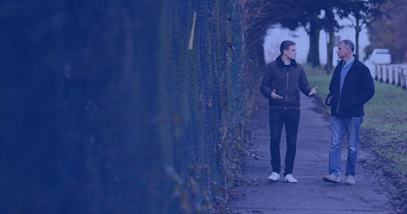 We are EXIT HATE UK and we offer non-judgemental support and advice Two people sat in a coffee shop, deep in conversation