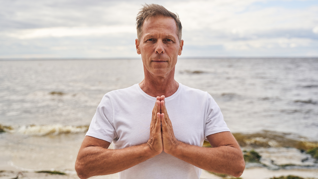 older man meditating