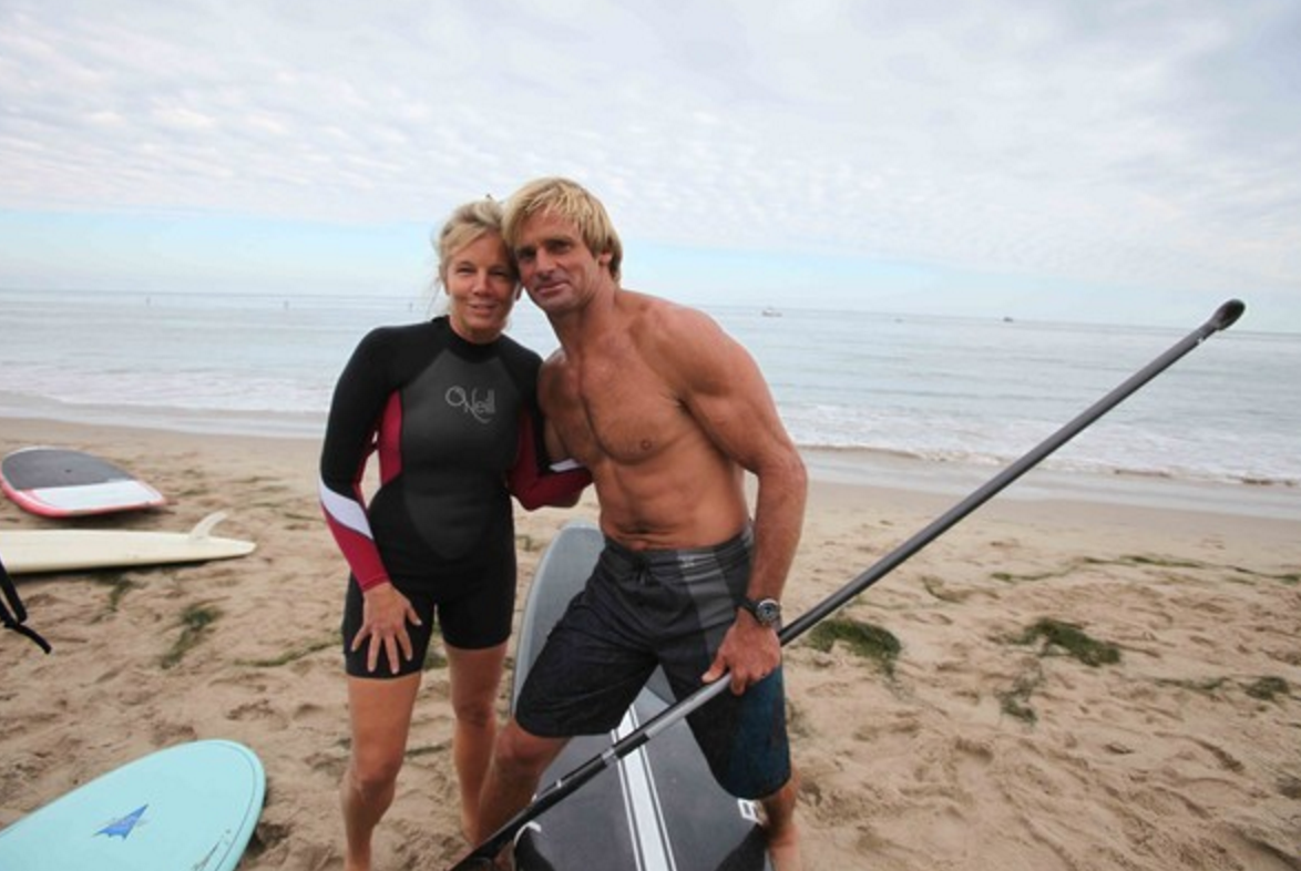 Kelly Chapman and Laird Hamilton on the beach