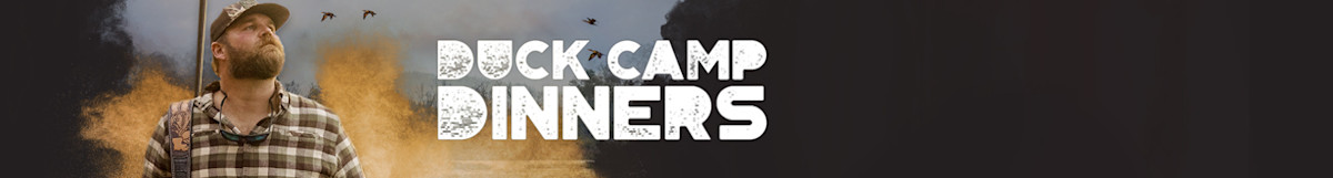 DUCK CAMP DINNERS text overlay; bearded hunter in plaid shirt and cap, ducks flying right