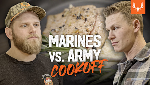 MARINES VS. ARMY COOKOFF; two men face off over roasted salmon