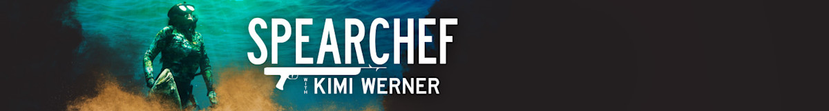 SPEARCHEF with KIMI WERNER, spearfisher in camo wetsuit holding fish underwater