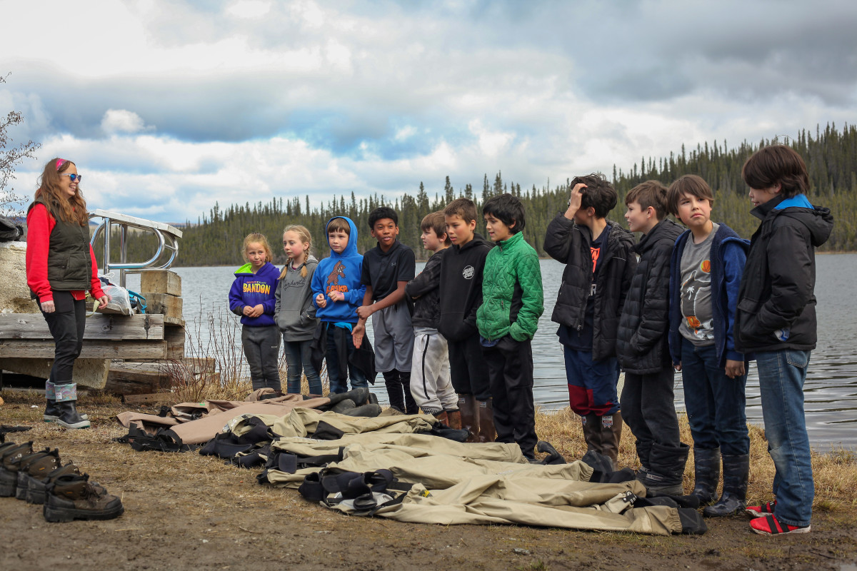 Alaskan Elementary students release salmon fry (2)