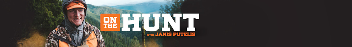 ON THE HUNT; WITH JANIS PUTELIS overlay, Janis Putelis smiling in camouflage and orange vest