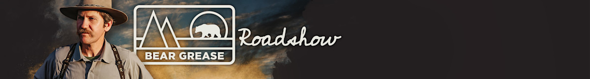 BEAR GREASE Roadshow — man with mustache in hat and suspenders at left