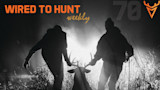 WIRED TO HUNT weekly: two silhouetted hunters dragging a deer through tall grass at night