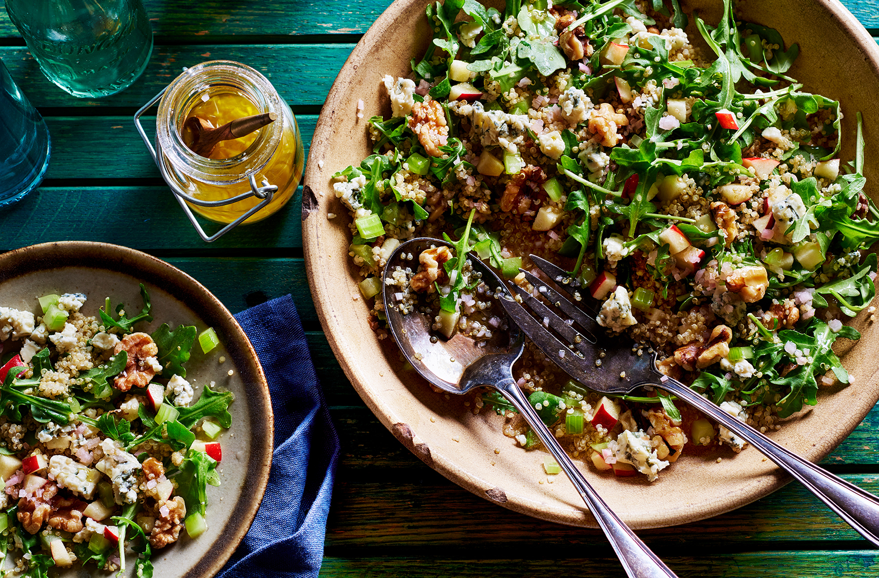 A large bowl of Waldorf Salad with Quinoa and baby arugula