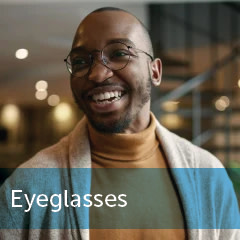 Smiling man wearing prescription trendy eyeglasses square tile