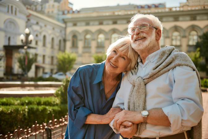 Happy cataract and glaucoma patient older couple on vacation