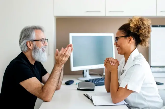 doctor talking with patient