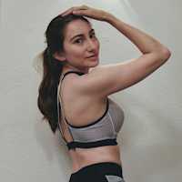 side shot of auther in fitness gear