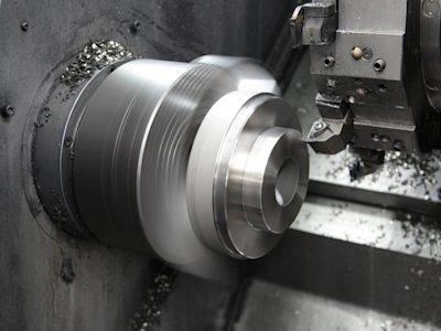 CNC lathe machine in action.
