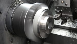 CNC lathe machine in action.