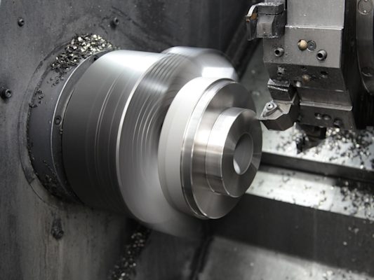 CNC lathe machine in action.