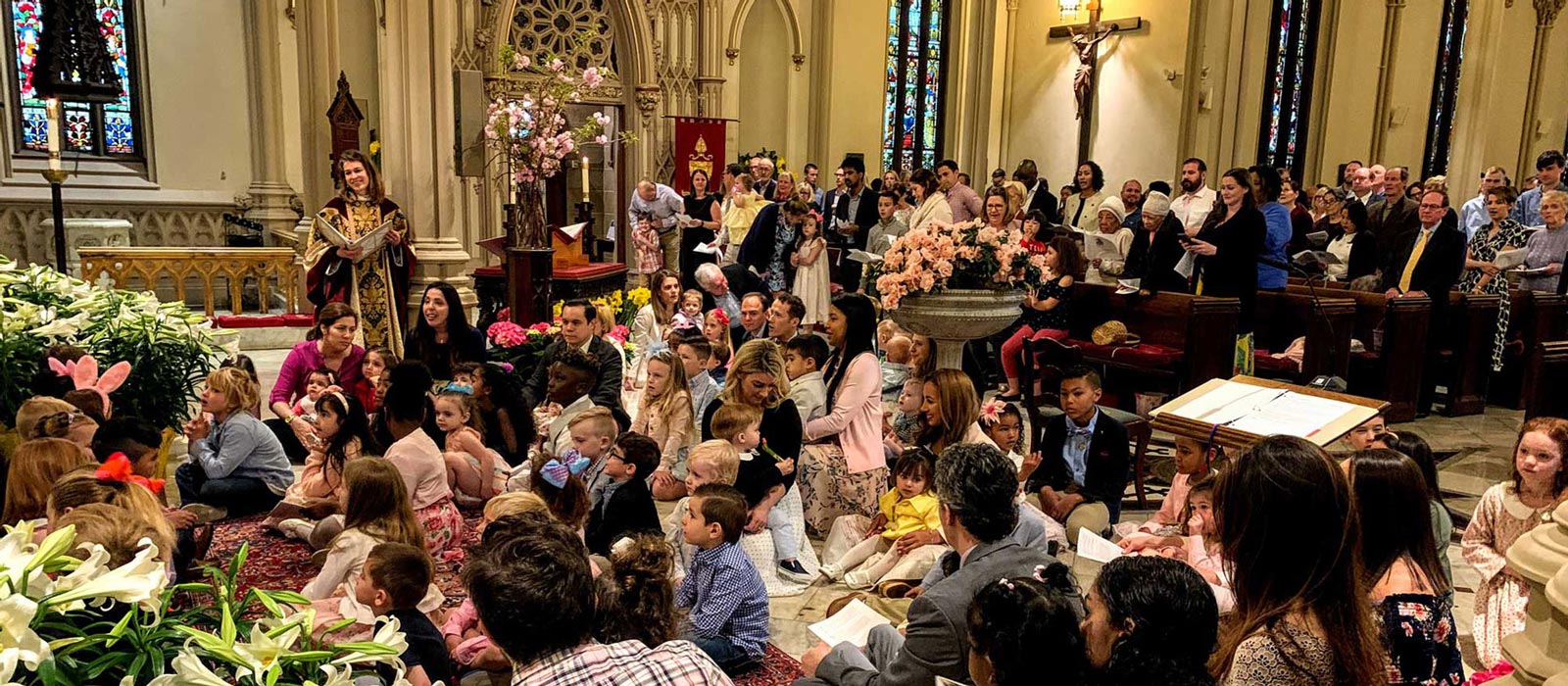 Large congregation of families gathering during Easter worship