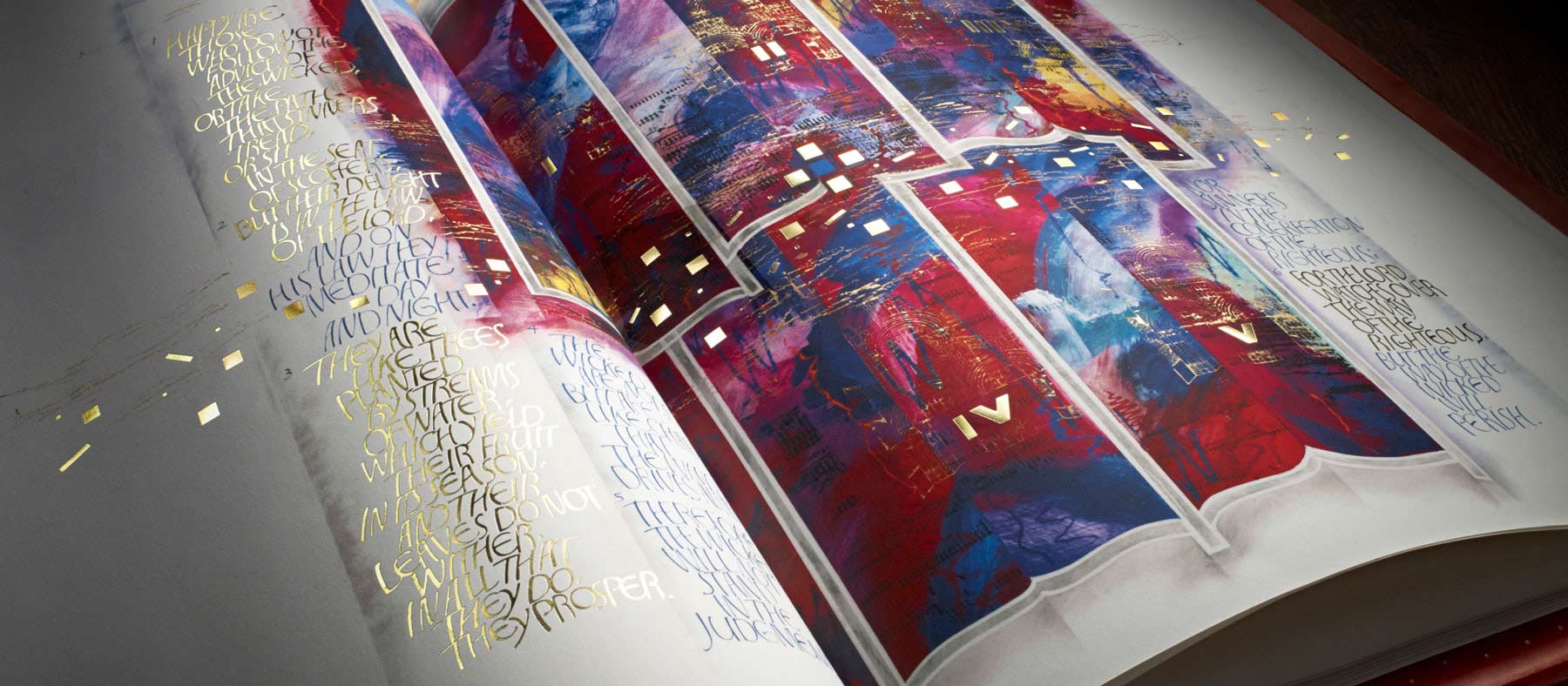 Open bible with colorful illuminated manuscript