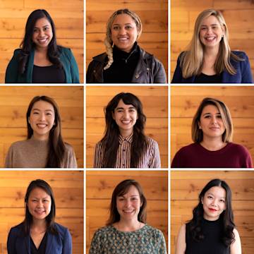 Women posing for a camera.