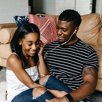 Couple listening to music together.