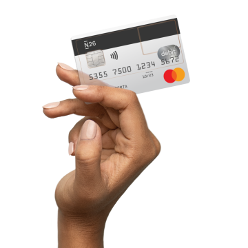 A hand holding the Standard N26 card.