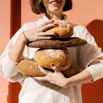 Small business owner woman with bread.