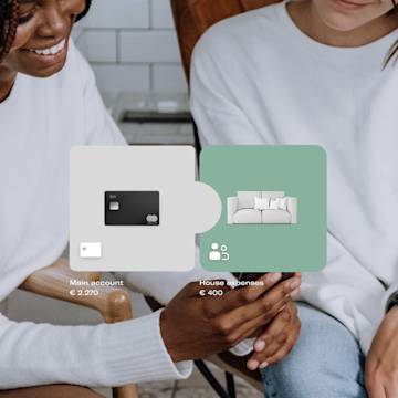 Shared Spaces icons and two girls checking a smartphone in the background.