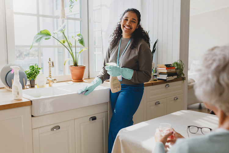 Woman cleaning sink