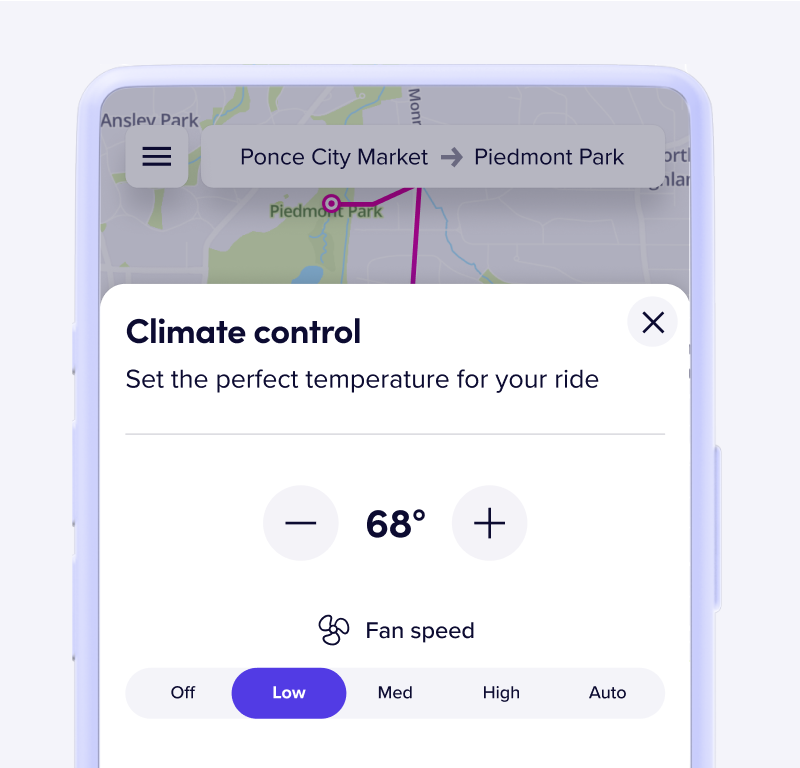 Lyft app screen showing climate control settings at 68 degrees with fan speed set to low.