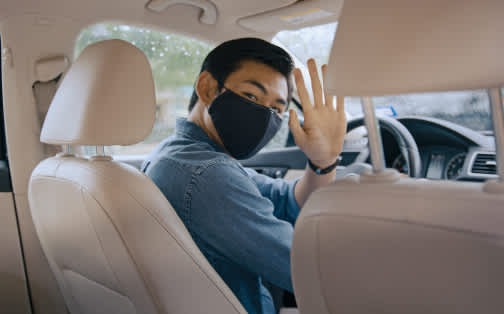 Lyft driver wearing a mask