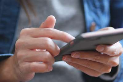 Messaging / WhatsApp / woman-finger-touch-on-cellphone-2023-11-27-05-34-16-utc.jpg