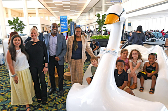 Press release photo of Orlando International Airport (MCO) that has officially opened its first Family Zone in Terminal C: the Flybrary! This new reading space features a collection of children’s books, offering young travelers and their families a comfortable place to relax and enjoy stories together.