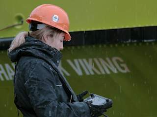 Rugged Controller in use during ship inspection in rainy weather