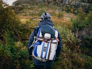 Blueye Pioneer strapped to Rune's backpack