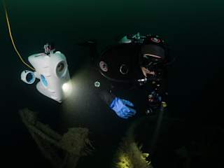 Dive buddy - our drones allow you to dive while staying dry on top