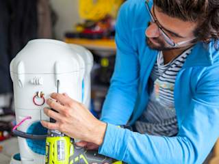 Electrical and software engineer Borja working on PioneerOne prototype