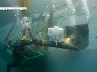Retrieving torpedoes from Helge Ingstad