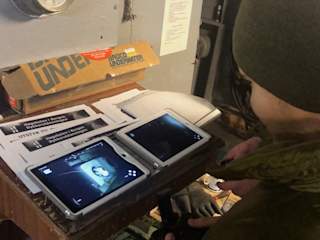 Soldier controlling the Blueye inside a torpedo chamber
