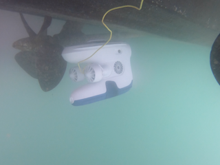Inspecting vessel hull and propeller