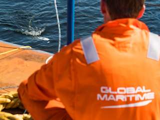 Global Maritime piloting the underwater drone from the barge