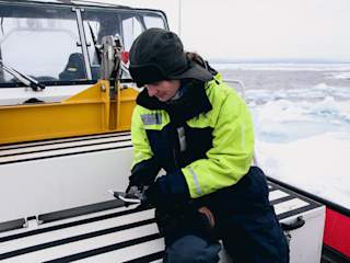 Research member piloting the drone