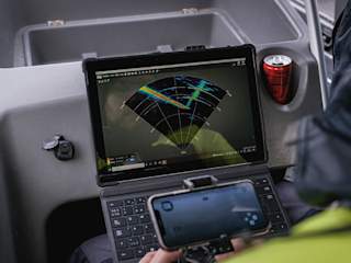 ROV pilot from boat looking at multibeam sonar imagery