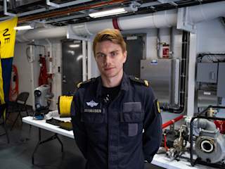 Erik Johansen from KV Bjørnøya posing inside at the heli deck