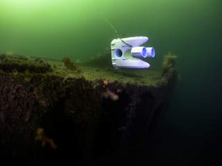 Exploring the Korsvika barge wreck in green plankton rich summer water