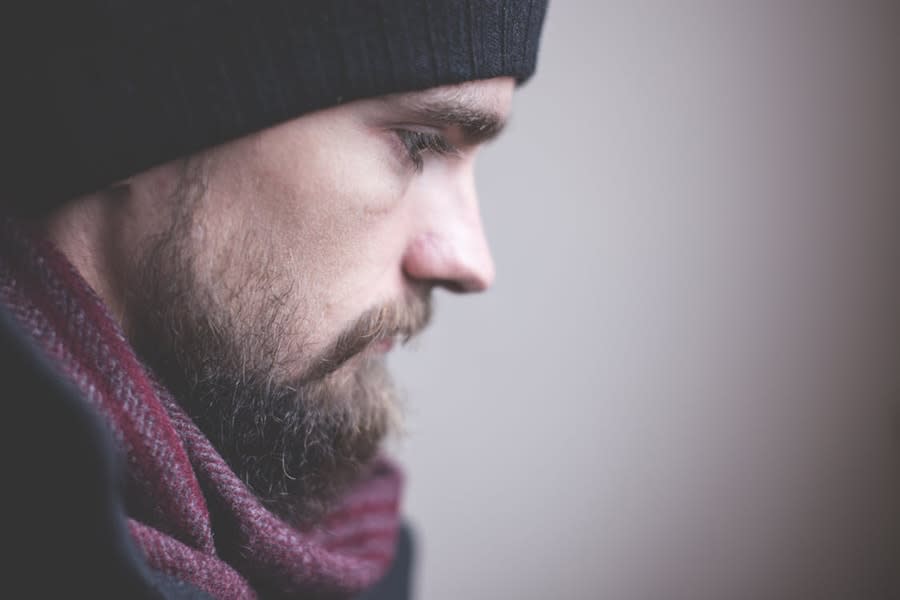 Man with red scarf