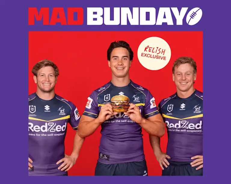 Melbourne Storm team members holding a Grilld Burger. Mad Bunday graphic and Relish Exclusive callout