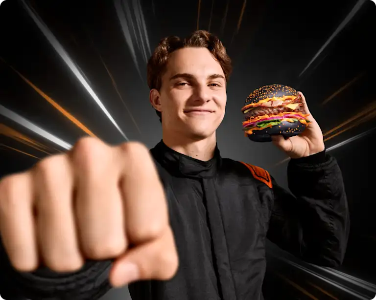 Oscar Piastri holding his signature Oscar Piastri burger